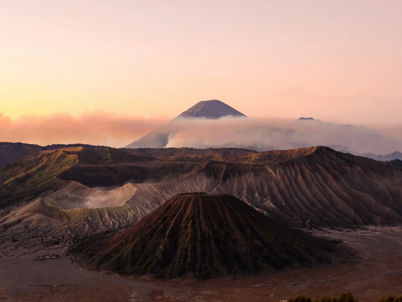 Silhouette of Mount Bromo against the dawn sky